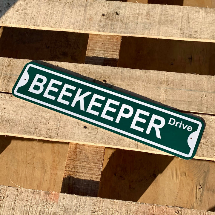 Sign: " BEEKEEPER drive " size 18" X 4"